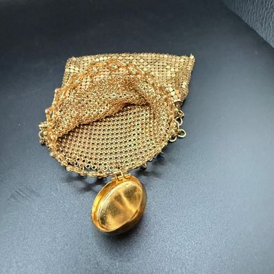 LOT 253: Antique Whiting and Davis Goldtone Metal Mesh Ring Purse, Antique Black Satin Opera Gloves and Embroidered Handkerchiefs