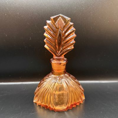 LOT 255: Amber Glass Perfume Bottler with Feather Fan Stopper, Blue Glass Cameo Perfume Atomizer and Amber Glass Bowl