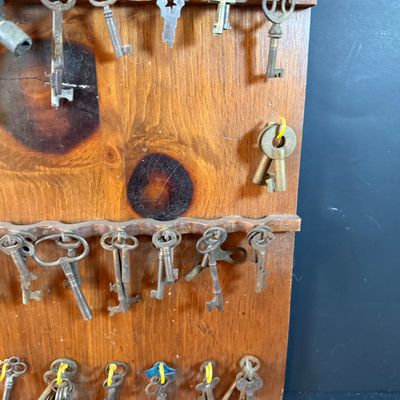 LOT 246: Large Collection of Keys on a Wooden Board and In a Wooden Box