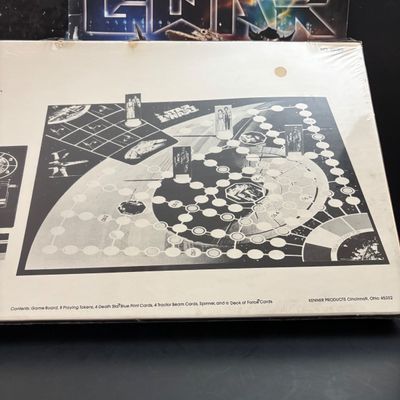 LOT 101: Vintage Unopened Kenner Star Wars Board Game, The Empire Strikes Back LP Soundtrack & Gwar Lust in Space Program Booklet