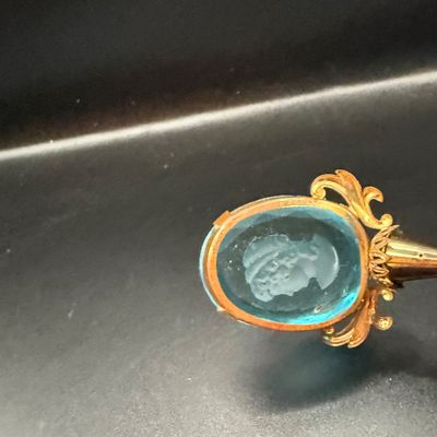 LOT 255: Amber Glass Perfume Bottler with Feather Fan Stopper, Blue Glass Cameo Perfume Atomizer and Amber Glass Bowl