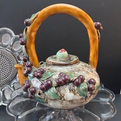 LOT 121: Vintage Tableware & Kitchen Decor: Majolica-Style Grape/Green Leaf Teapot, Rustic Wood Nut Bowl. Egg Dish, Fruit Motif...