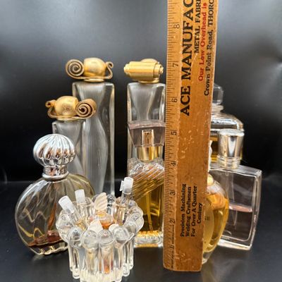 LOT 258: Collection of Designer Perfume and Perfume Bottles Including Givenchy, Guerlain and More