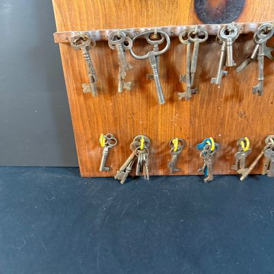 LOT 246: Large Collection of Keys on a Wooden Board and In a Wooden Box