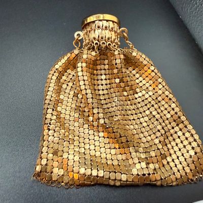 LOT 253: Antique Whiting and Davis Goldtone Metal Mesh Ring Purse, Antique Black Satin Opera Gloves and Embroidered Handkerchiefs