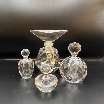 LOT 257: Collection of Cut Crystal Perfume Bottles by Oleg Cassini and More