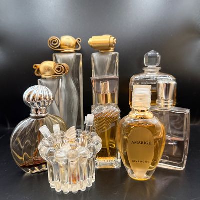 LOT 258: Collection of Designer Perfume and Perfume Bottles Including Givenchy, Guerlain and More