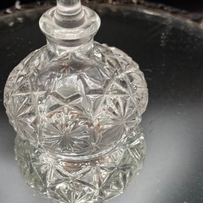 LOT 254: Mirrored Vanity Tray with Perfume Bottles Including Jordache Perfume by Armani and Guerlain Baccarat Bottle and More
