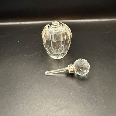LOT 257: Collection of Cut Crystal Perfume Bottles by Oleg Cassini and More