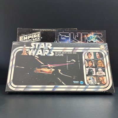 LOT 101: Vintage Unopened Kenner Star Wars Board Game, The Empire Strikes Back LP Soundtrack & Gwar Lust in Space Program Booklet