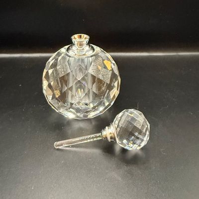 LOT 257: Collection of Cut Crystal Perfume Bottles by Oleg Cassini and More