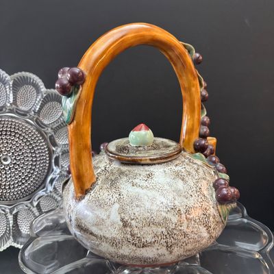 LOT 121: Vintage Tableware & Kitchen Decor: Majolica-Style Grape/Green Leaf Teapot, Rustic Wood Nut Bowl. Egg Dish, Fruit Motif...