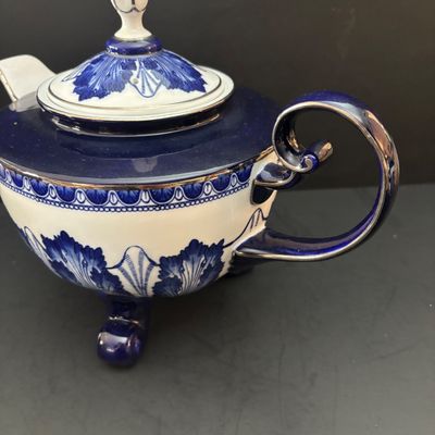 LOT 97: Bombay & Company Arabesque Cobalt Blue & White Teapot, Sugar Bowl, Creamer