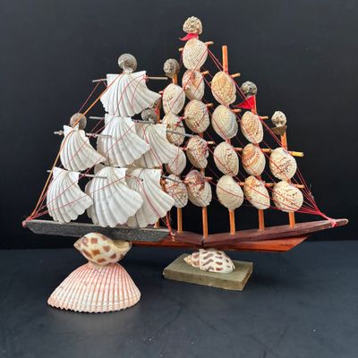 LOT 108: Nautical Collection of Seashell Ships, Meico Paul Sebastian "Fishing w/Grandfather" Porcelain Figurine, Large Corals...