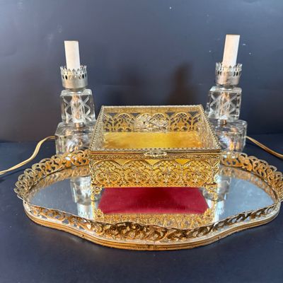 LOT 244: Hollywood Regency Style Filigree Vanity Mirror and Jewelry Box with Glass Lid and Acrylic Cubed Table Lamps