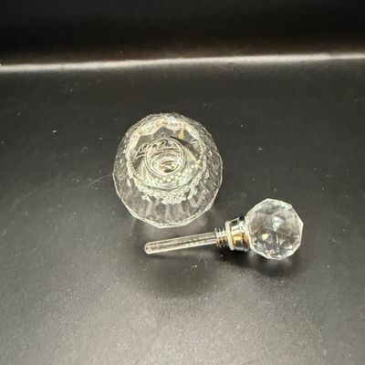 LOT 257: Collection of Cut Crystal Perfume Bottles by Oleg Cassini and More