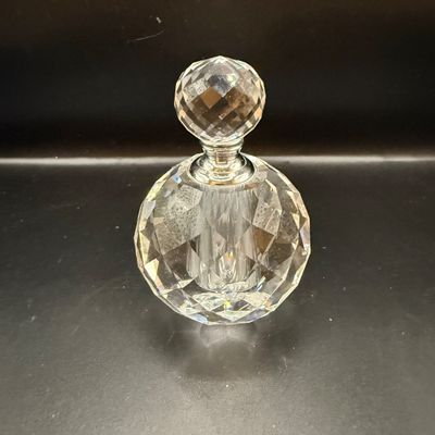 LOT 257: Collection of Cut Crystal Perfume Bottles by Oleg Cassini and More