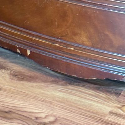 LOT 182: Bowed Front Chest of Drawers with Pull-Out Slide and Oval Hardware and Removable Glass Top