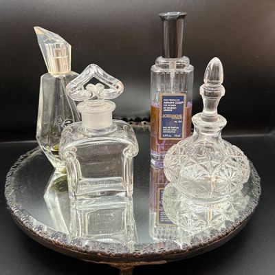 LOT 254: Mirrored Vanity Tray with Perfume Bottles Including Jordache Perfume by Armani and Guerlain Baccarat Bottle and More