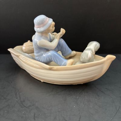 LOT 108: Nautical Collection of Seashell Ships, Meico Paul Sebastian "Fishing w/Grandfather" Porcelain Figurine, Large Corals...
