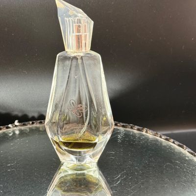 LOT 254: Mirrored Vanity Tray with Perfume Bottles Including Jordache Perfume by Armani and Guerlain Baccarat Bottle and More