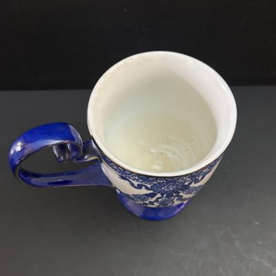 LOT 98: Vintage Bombay & Co. Cobalt Blue & White Footed Coffee Pot, "Grace" Mug, Porcelain Handle Serving Pieces &...