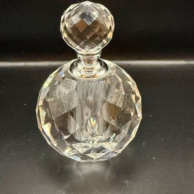 LOT 257: Collection of Cut Crystal Perfume Bottles by Oleg Cassini and More