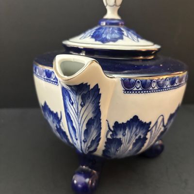 LOT 97: Bombay & Company Arabesque Cobalt Blue & White Teapot, Sugar Bowl, Creamer