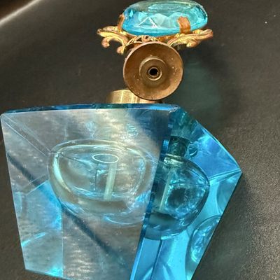 LOT 255: Amber Glass Perfume Bottler with Feather Fan Stopper, Blue Glass Cameo Perfume Atomizer and Amber Glass Bowl