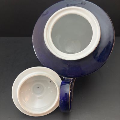 LOT 97: Bombay & Company Arabesque Cobalt Blue & White Teapot, Sugar Bowl, Creamer
