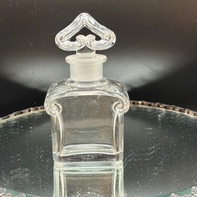 LOT 254: Mirrored Vanity Tray with Perfume Bottles Including Jordache Perfume by Armani and Guerlain Baccarat Bottle and More