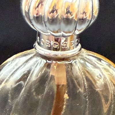 LOT 258: Collection of Designer Perfume and Perfume Bottles Including Givenchy, Guerlain and More