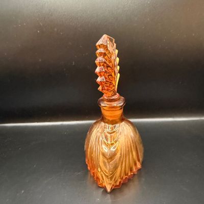LOT 255: Amber Glass Perfume Bottler with Feather Fan Stopper, Blue Glass Cameo Perfume Atomizer and Amber Glass Bowl