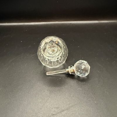 LOT 257: Collection of Cut Crystal Perfume Bottles by Oleg Cassini and More