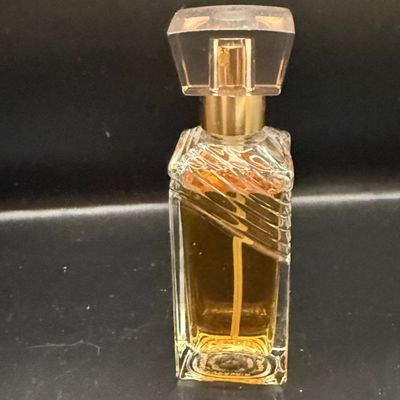 LOT 258: Collection of Designer Perfume and Perfume Bottles Including Givenchy, Guerlain and More