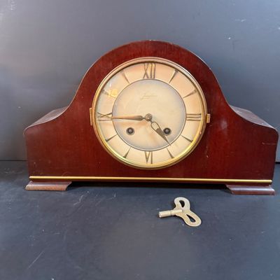 LOT 252: Vintage Junghans Art Deco Mantel Clock and Alabaster Vase