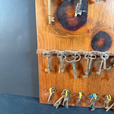 LOT 246: Large Collection of Keys on a Wooden Board and In a Wooden Box