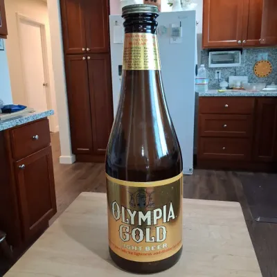 Sale Photo Thumbnail #103: Vintage olympia gold beer bottle coin bank third image