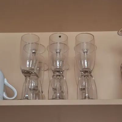 Sale Photo Thumbnail #153: Set of clear glass champagne flutes