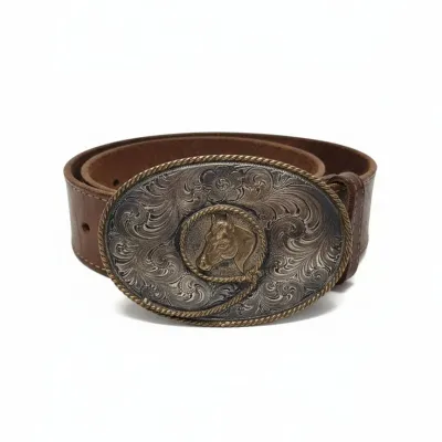 Sale Photo Thumbnail #335: Vintage western horse head belt buckle with tooled leather belt