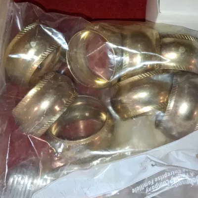 Sale Photo Thumbnail #90: Vintage brass napkin rings set