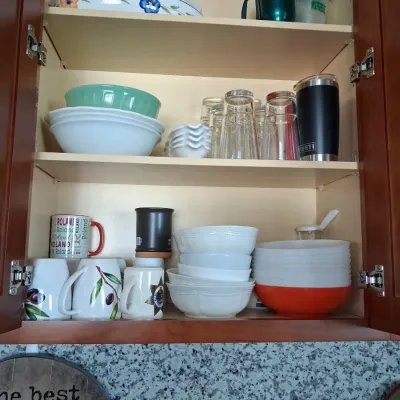 Sale Photo Thumbnail #39: Assorted kitchenware with roland themed mug and yeti tumbler