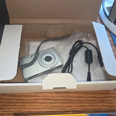 Sale Photo Thumbnail #225: Olympus fe digital camera with original box and accessories