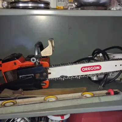 Sale Photo Thumbnail #559: Homelite chainsaw with oregon guide bar