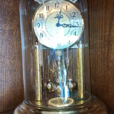 Sale Photo Thumbnail #399: Schatz day anniversary clock with floral engraved dial