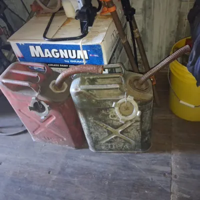 Sale Photo Thumbnail #561: Pair of vintage gallon us military jerry cans