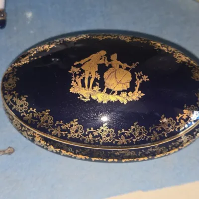 Sale Photo Thumbnail #220: Limoges cobalt blue and gold courting couple oval trinket box