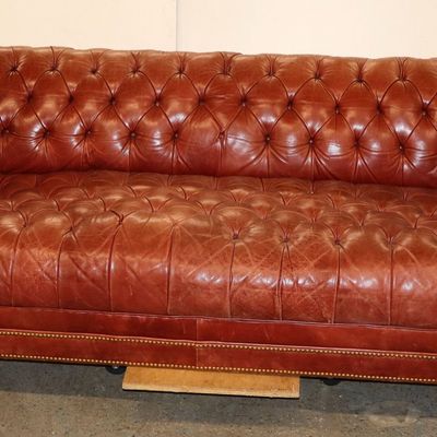 Sale Photo Thumbnail #324: Chesterfield style button tuft leather even arm sofa