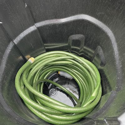 Sale Photo Thumbnail #208: Garbage can of hoses