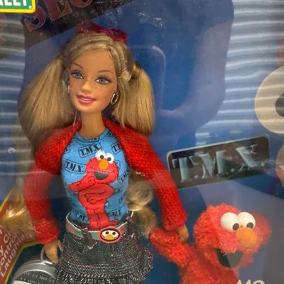 Sesame Street Barbie with Tickle me, Elmo unopened box excellent condition